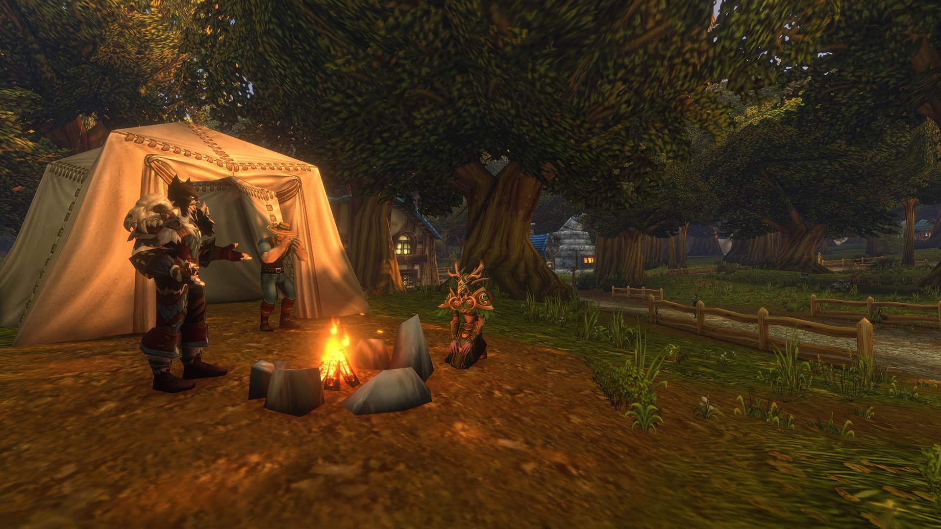 Three adventurers gather around a campfire beside a canvas tent in Blizzard's Forever Camping preview.