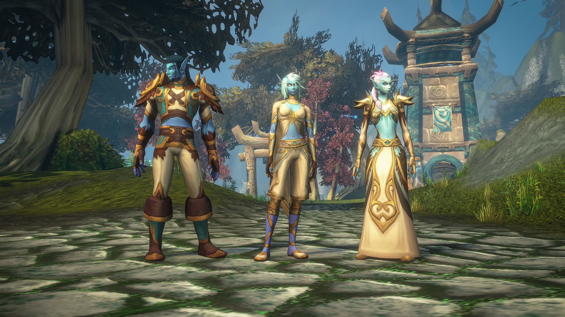 Three Skyborne characters stand beside carved stone architecture in Blizzard's announcement preview.